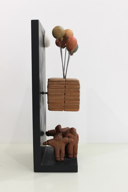 Peso della cultura | Palloncini - scultura di Vincent Maillard (lato 1)